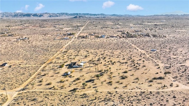 aerial view with view of desert and a mountain view