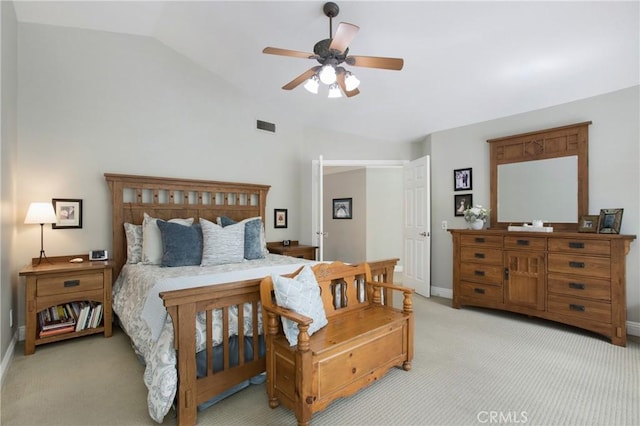 bedroom featuring visible vents, a ceiling fan, light carpet, vaulted ceiling, and baseboards