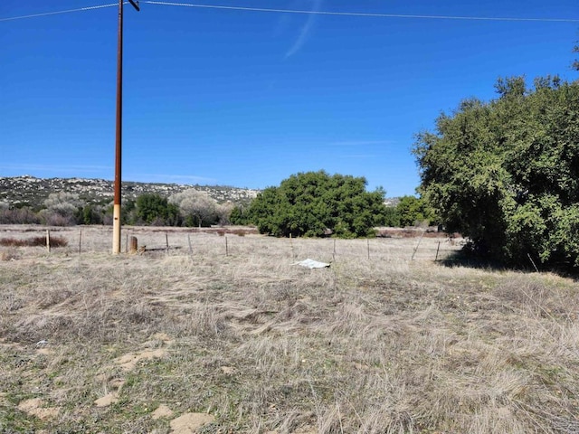 view of yard featuring a rural view