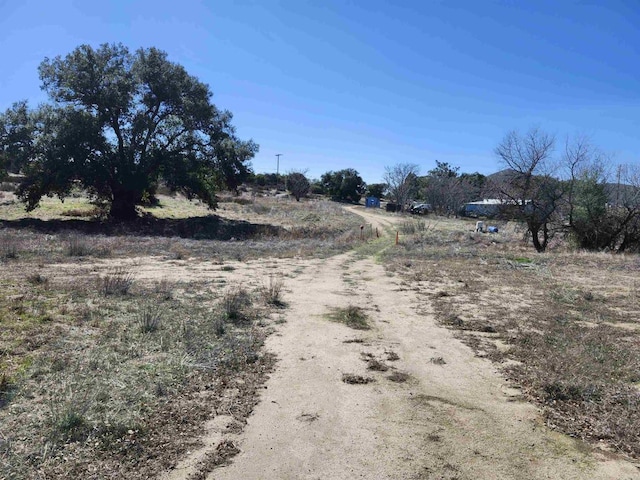 view of road with a rural view