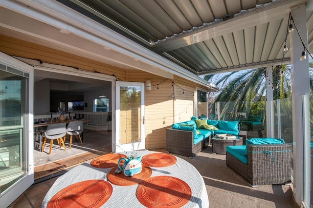 view of patio featuring outdoor lounge area and outdoor dining space