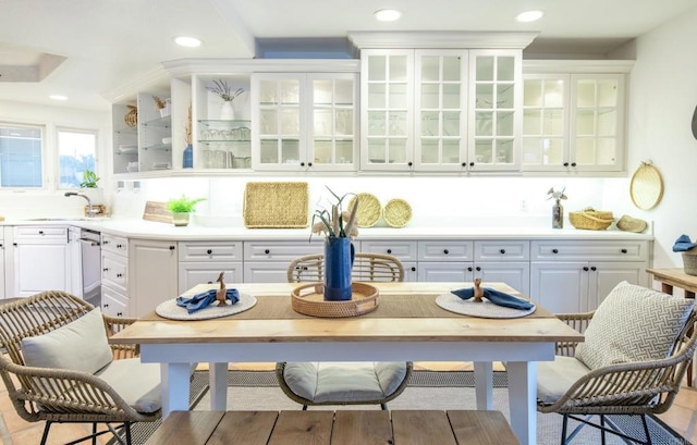 interior space featuring recessed lighting and a sink