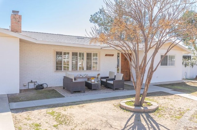 view of patio with an outdoor living space