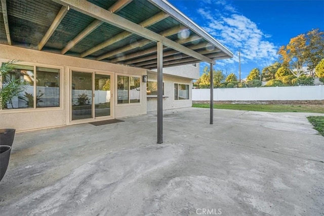 view of patio / terrace with fence