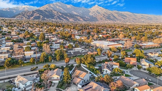 drone / aerial view with a residential view and a mountain view