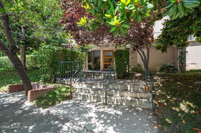 exterior space featuring stucco siding