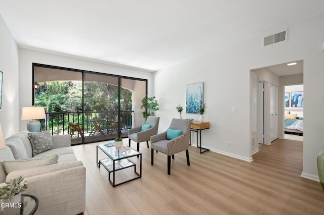 4200 Via Arbolada Unit 207, Los Angeles, CA 90042 - living area featuring light wood-style floors and baseboards