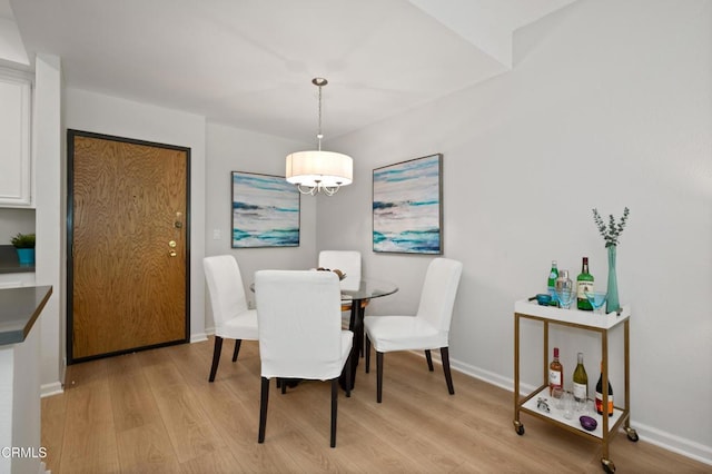 4200 Via Arbolada Unit 207, Los Angeles, CA 90042 - dining space featuring light wood-style floors and baseboards