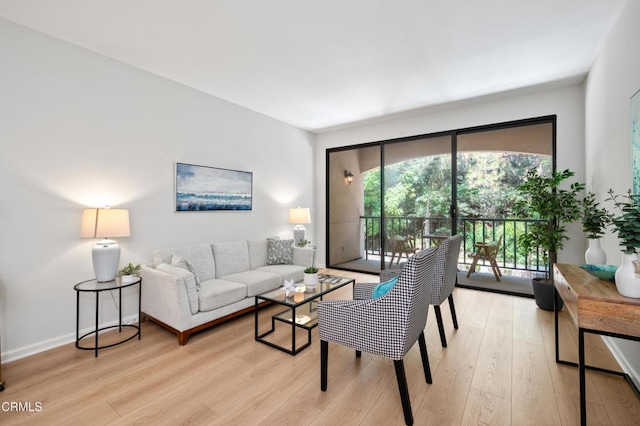4200 Via Arbolada Unit 207, Los Angeles, CA 90042 - living room featuring light wood-style floors and healthy amount of natural light
