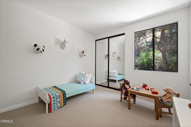 4200 Via Arbolada Unit 207, Los Angeles, CA 90042 - carpeted bedroom featuring baseboards and a closet