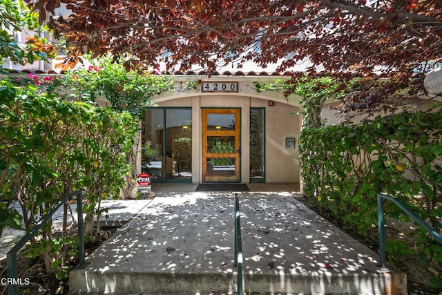 4200 Via Arbolada Unit 207, Los Angeles, CA 90042 - doorway to property with stucco siding