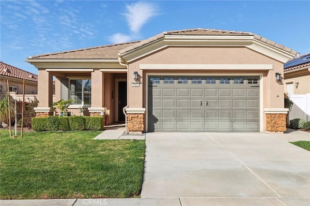 view of front of house featuring stone siding, a front yard, concrete driveway, and stucco siding