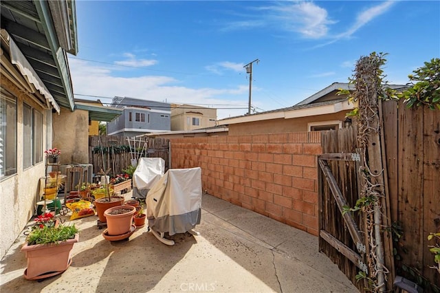 view of patio with a fenced backyard