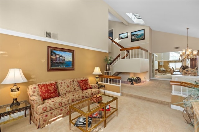 living area with light carpet, visible vents, an inviting chandelier, and stairs