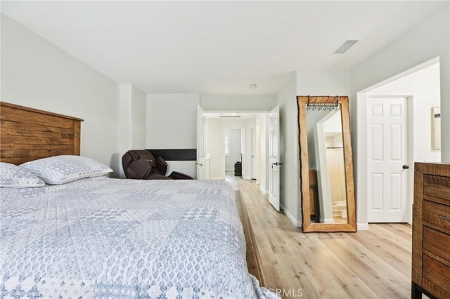 25781 Perlman Pl Unit B, Stevenson Ranch, CA 91381 - bedroom featuring light wood-type flooring and baseboards