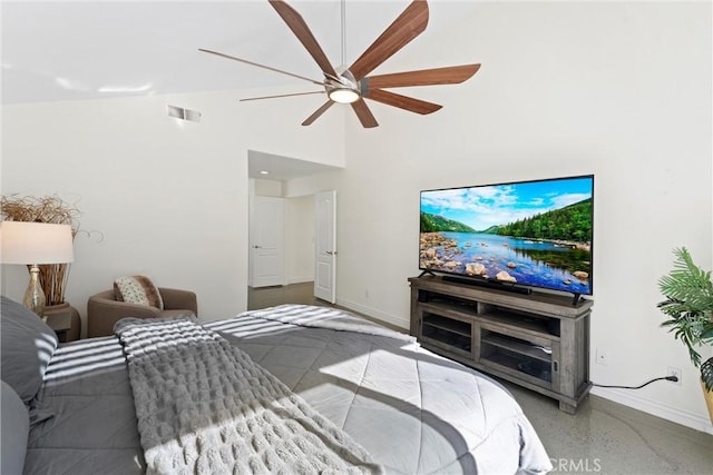 bedroom featuring speckled floor, a towering ceiling, visible vents, and baseboards