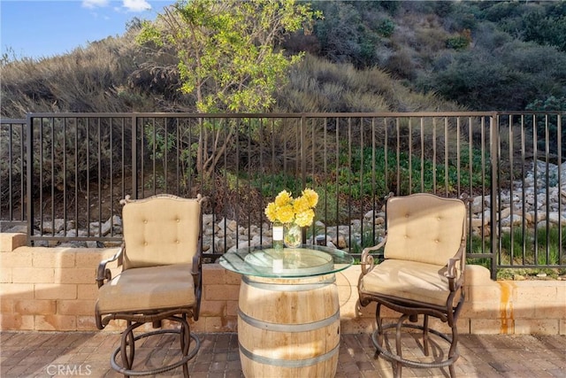 view of patio / terrace with fence