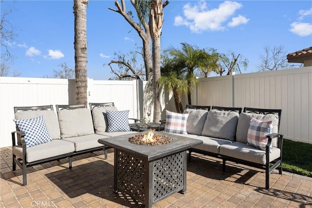 view of patio / terrace featuring a fenced backyard and an outdoor hangout area