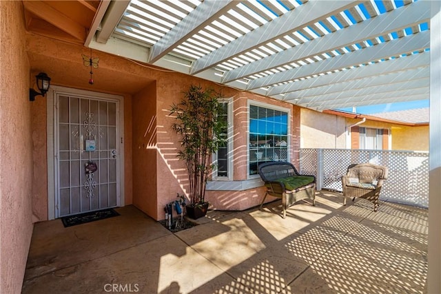 view of patio / terrace featuring a pergola