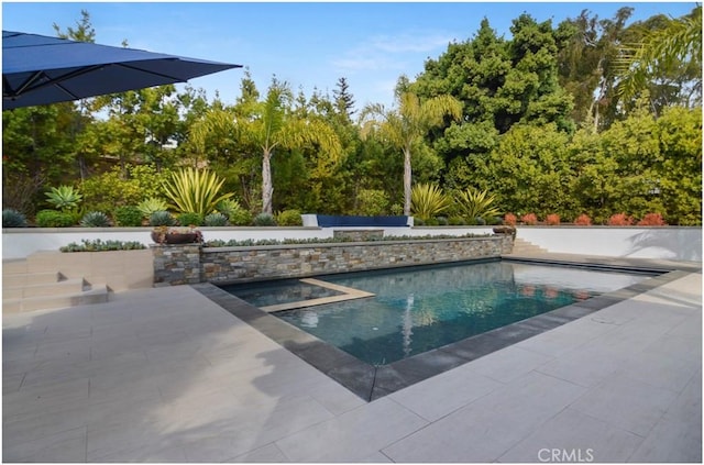 pool featuring a patio