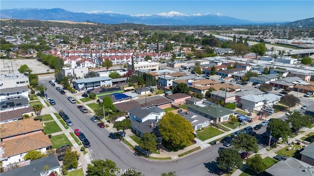 bird's eye view with a residential view and a mountain view