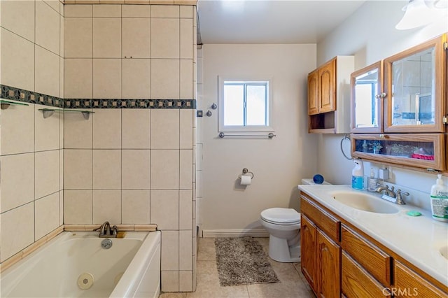 full bathroom featuring double vanity, a whirlpool tub, a sink, tile patterned flooring, and toilet