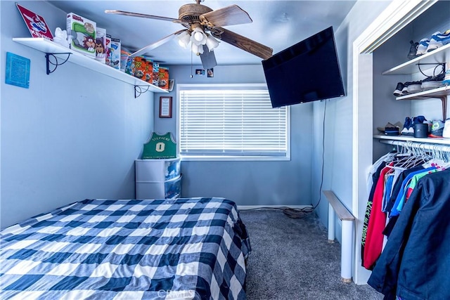 carpeted bedroom featuring a ceiling fan