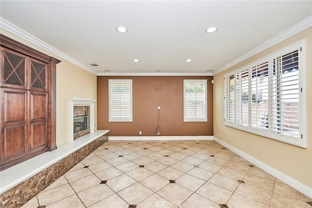 unfurnished living room with baseboards, a fireplace, and ornamental molding