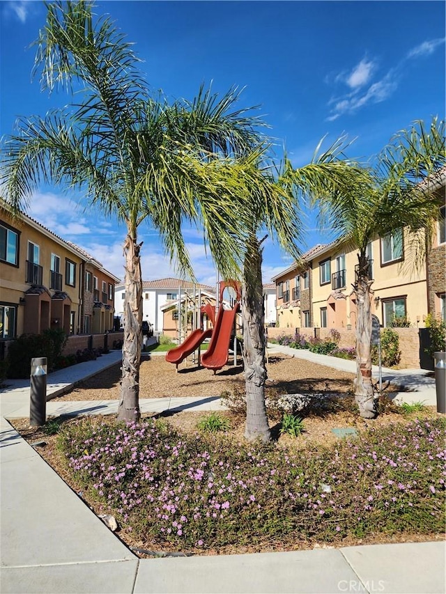 communal playground with a residential view