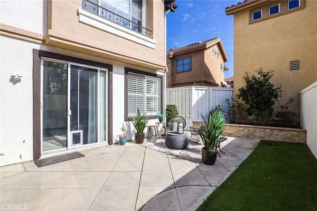 view of patio / terrace with fence