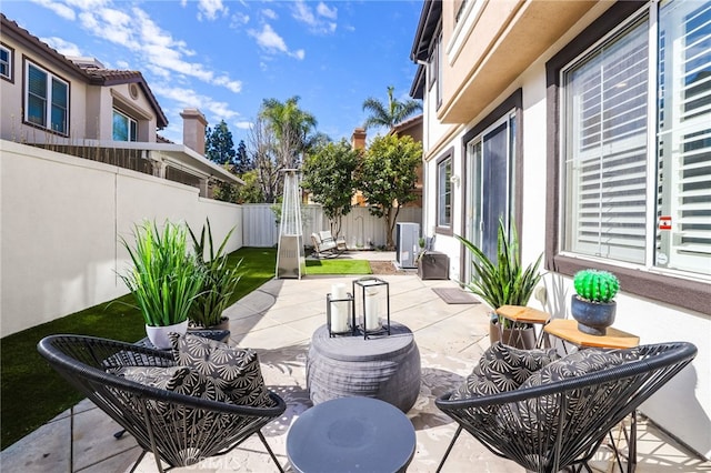 view of patio with a fenced backyard