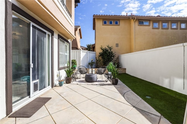 view of patio with fence