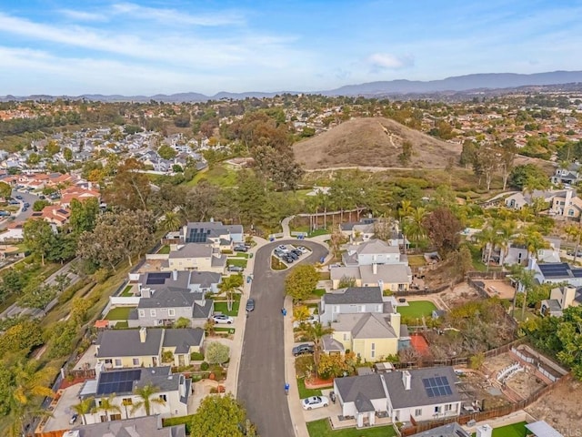 aerial view with a mountain view and a residential view