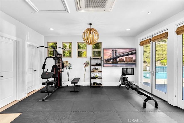 exercise room featuring recessed lighting, french doors, visible vents, and baseboards