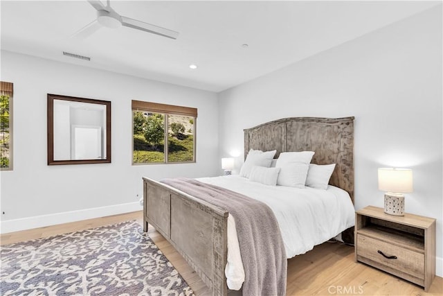 bedroom featuring light wood finished floors, baseboards, visible vents, ceiling fan, and recessed lighting