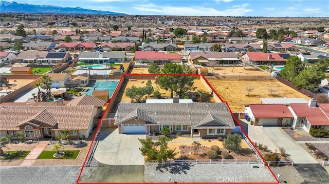 aerial view featuring a residential view and a mountain view