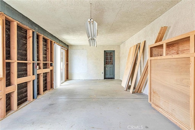 miscellaneous room featuring concrete flooring