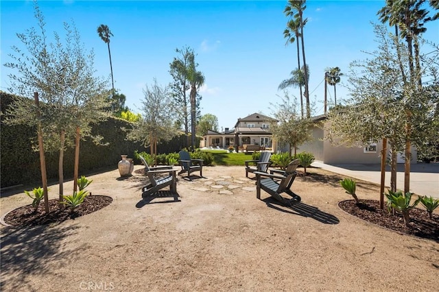 view of home's community with a patio