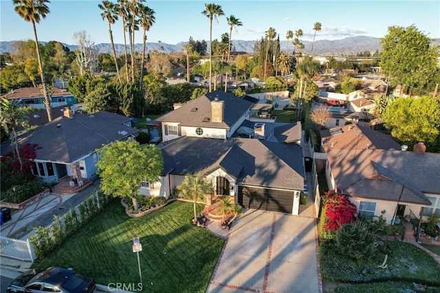 birds eye view of property featuring a residential view and a mountain view