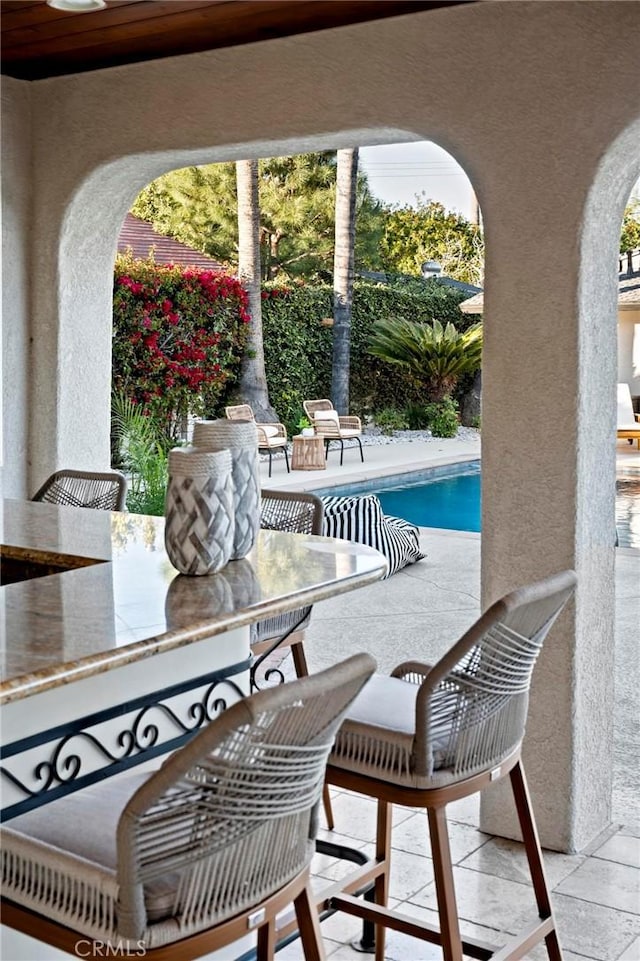 exterior space featuring an outdoor pool