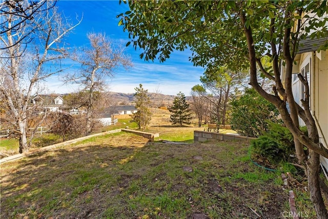 21013 Carriage Dr, Tehachapi, CA 93561 - view of yard with fence and a mountain view