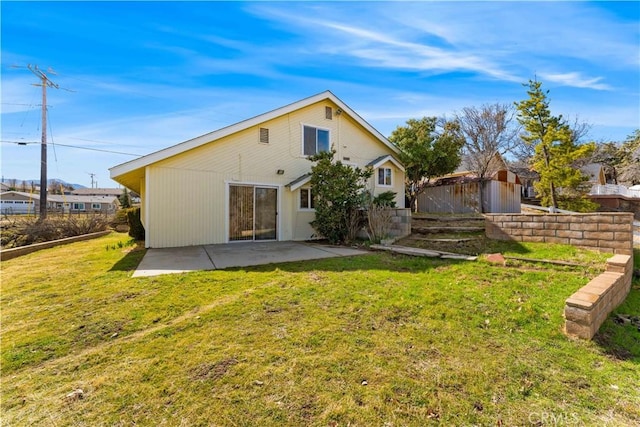 21013 Carriage Dr, Tehachapi, CA 93561 - rear view of house with a patio, fence, and a lawn