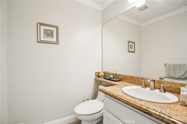 bathroom with ornamental molding, visible vents, vanity, and toilet