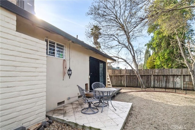 view of patio with fence