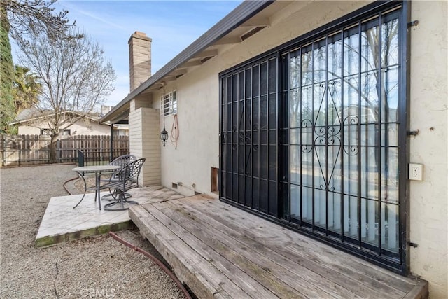 exterior space featuring a patio area and fence