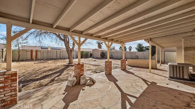 view of patio / terrace featuring a fenced backyard and central air condition unit