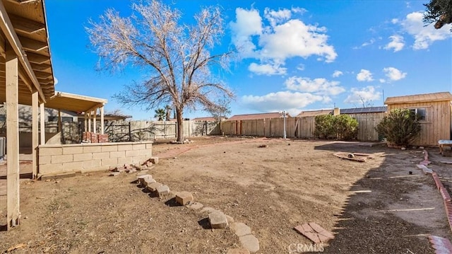 view of yard featuring a fenced backyard