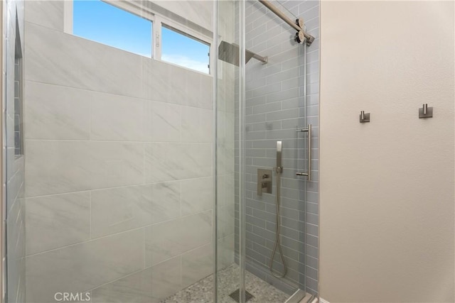 full bathroom featuring a shower stall