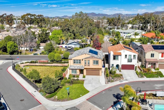 bird's eye view with a residential view and a mountain view