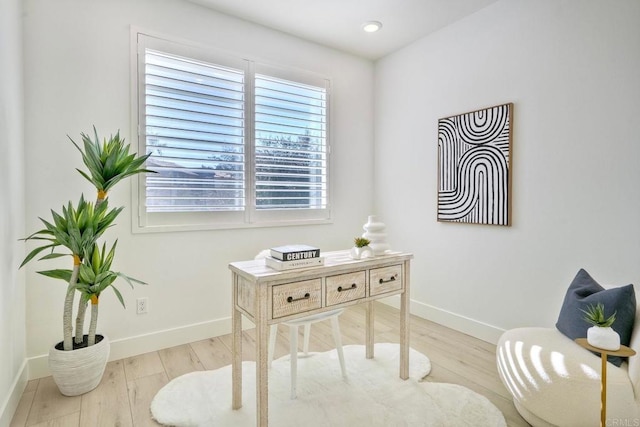 office featuring recessed lighting, light wood-style flooring, and baseboards